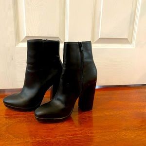 Sexy high heeled black booties